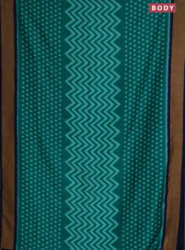 Semi patola saree teal green and navy blue with allover ikat weaves and woven border