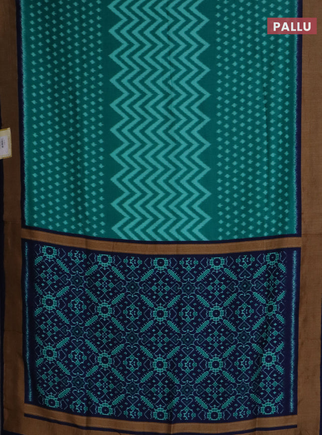 Semi patola saree teal green and navy blue with allover ikat weaves and woven border