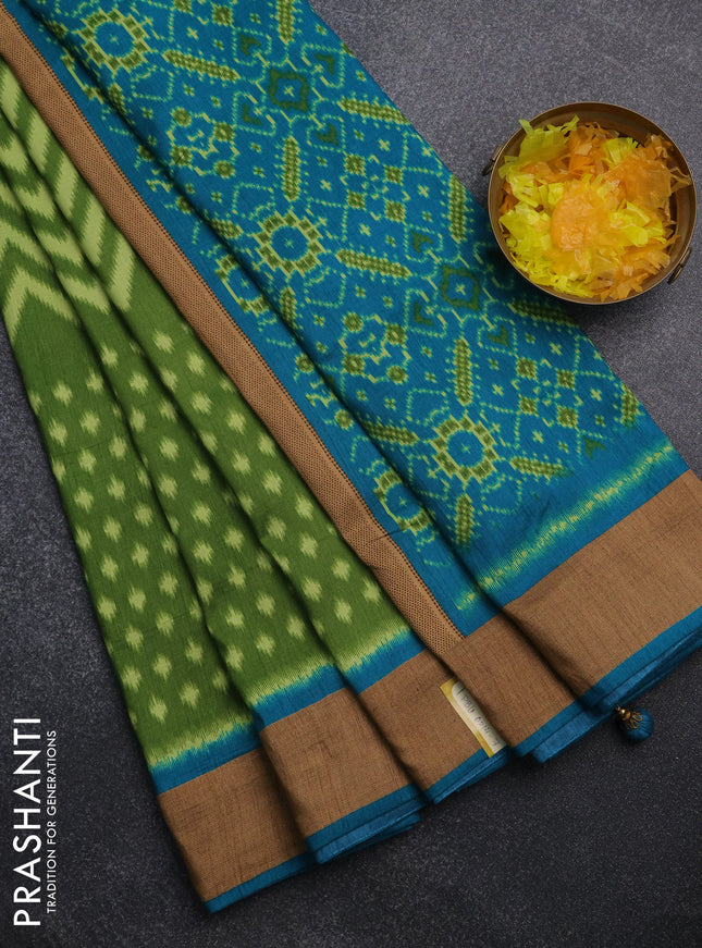 Semi patola saree green and cs blue with allover ikat weaves and woven border