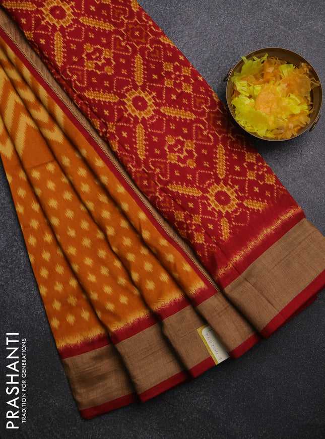Semi patola saree dark mustard and maroon with allover ikat weaves and woven border
