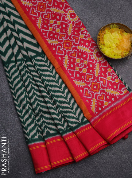 Semi patola saree dark green and pink with allover wevy weaves and simple border