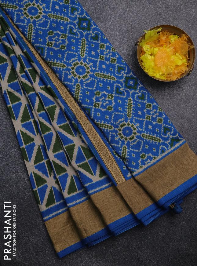 Semi patola saree green and cs blue with geometric weaves and woven border