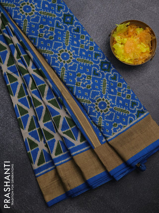 Semi patola saree green and cs blue with geometric weaves and woven border