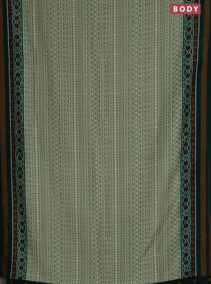Semi patola saree pastel green and dark green with allover ikat prints and simple border