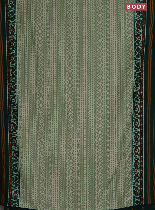 Semi patola saree pastel green and dark green with allover ikat prints and simple border