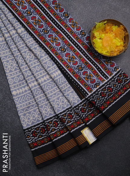 Semi patola saree grey and black with allover ikat prints and simple border