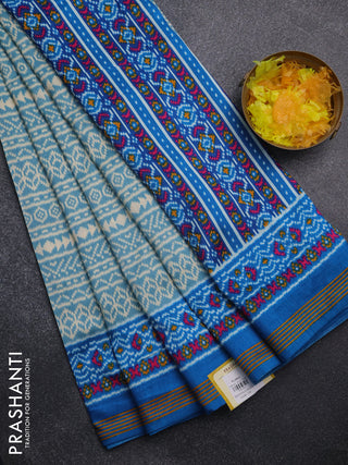 Semi patola saree pastel blue and cs blue with allover ikat prints and simple border