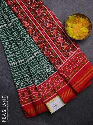 Semi patola saree green and red with allover ikat prints and simple border