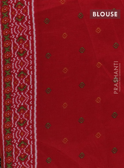 Semi patola saree green and red with allover ikat prints and simple border