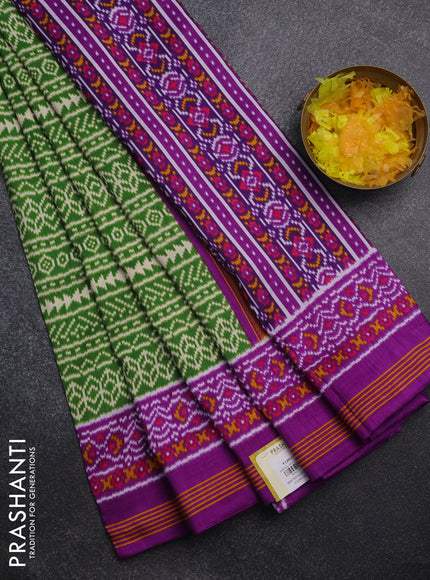Semi patola saree green and purple with allover ikat prints and simple border
