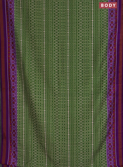 Semi patola saree green and purple with allover ikat prints and simple border