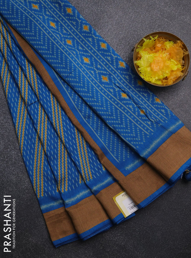 Semi patola saree cs blue with allover prints and woven border