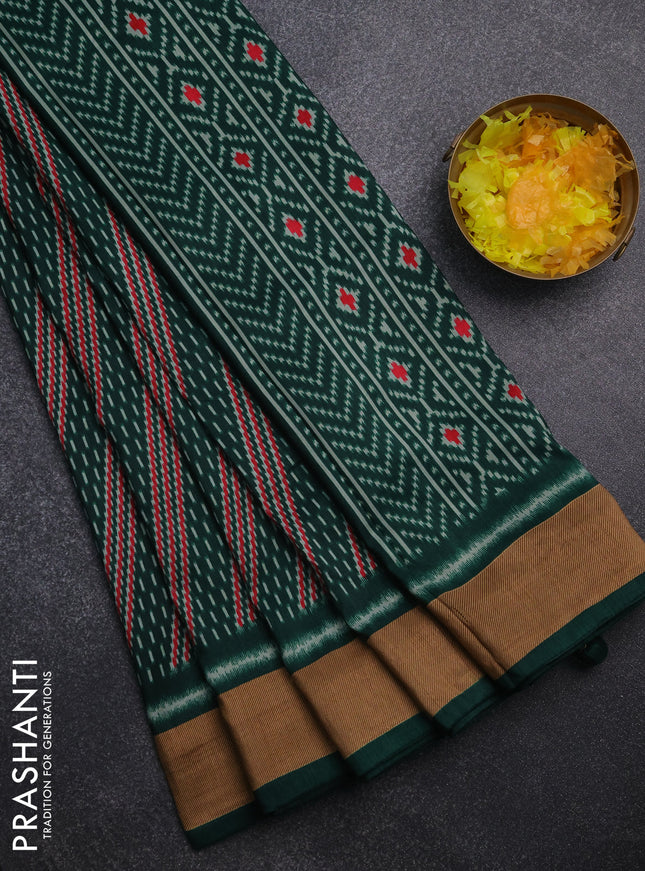 Semi patola saree dark green with allover prints and woven border