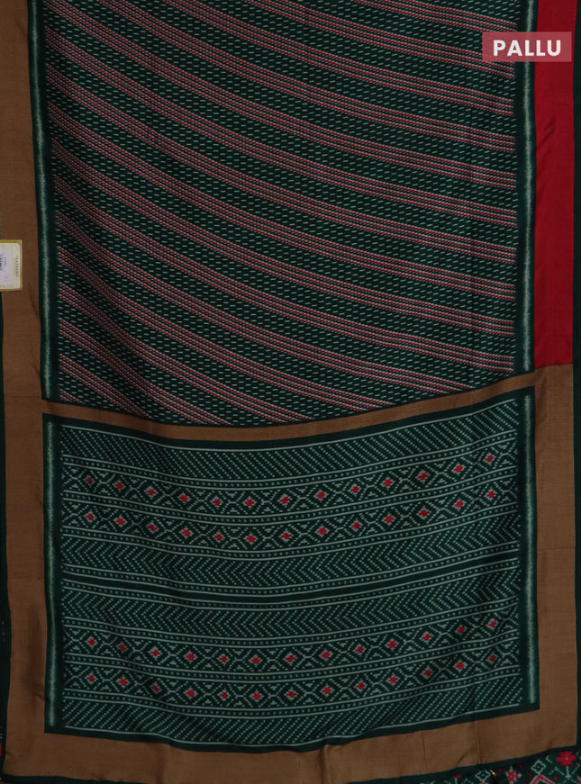Semi patola saree dark green with allover prints and woven border