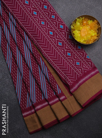 Semi patola saree wine shade with allover prints and woven border