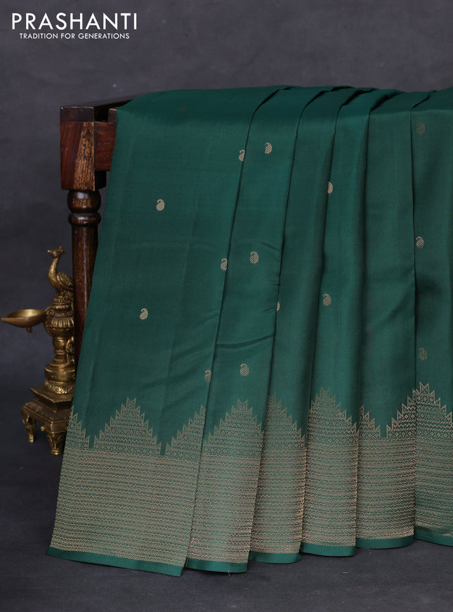Kanchipuram silk saree green with zari woven buttas and temple design zari woven border