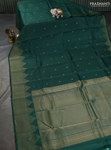 Kanchipuram silk saree green with zari woven buttas and temple design zari woven border