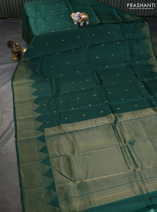 Kanchipuram silk saree green with zari woven buttas and temple design zari woven border
