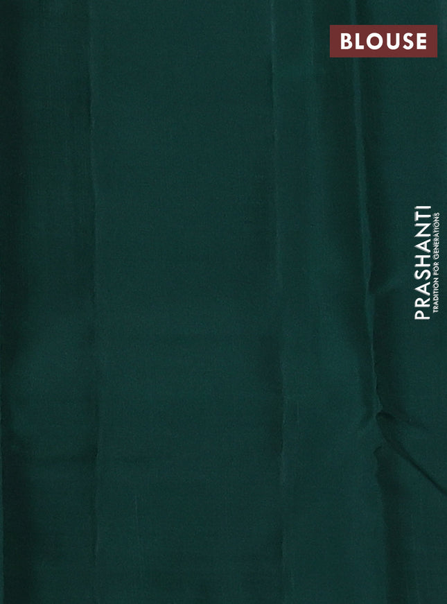 Kanchipuram silk saree green with zari woven buttas and temple design zari woven border