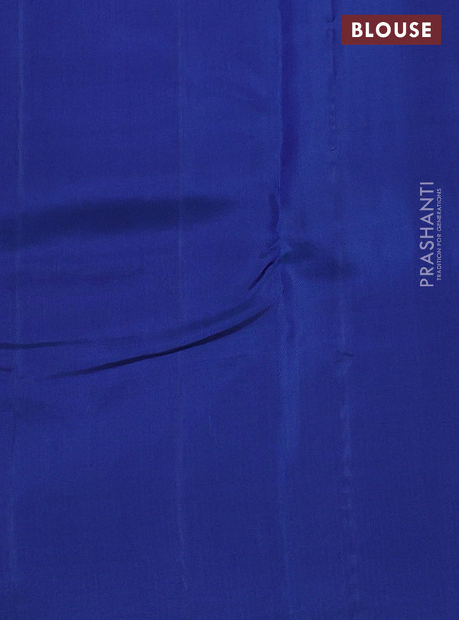 Kanchipuram silk saree red and blue with zari woven buttas and temple design zari woven border