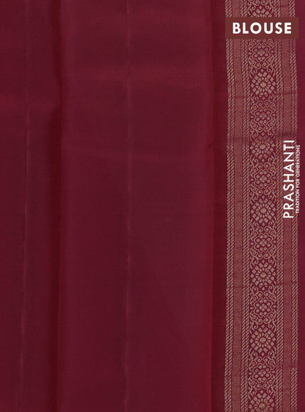 Kanchipuram silk saree pastel green and deep maroon with zari woven geometric buttas in borderless style