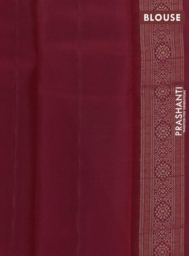 Kanchipuram silk saree pastel green and deep maroon with zari woven geometric buttas in borderless style