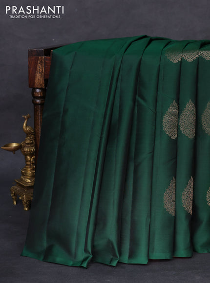 Kanchipuram silk saree bottle green and pink with zari woven buttas in borderless style