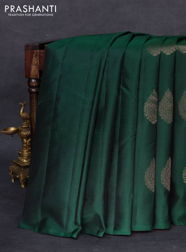 Kanchipuram silk saree bottle green and pink with zari woven buttas in borderless style