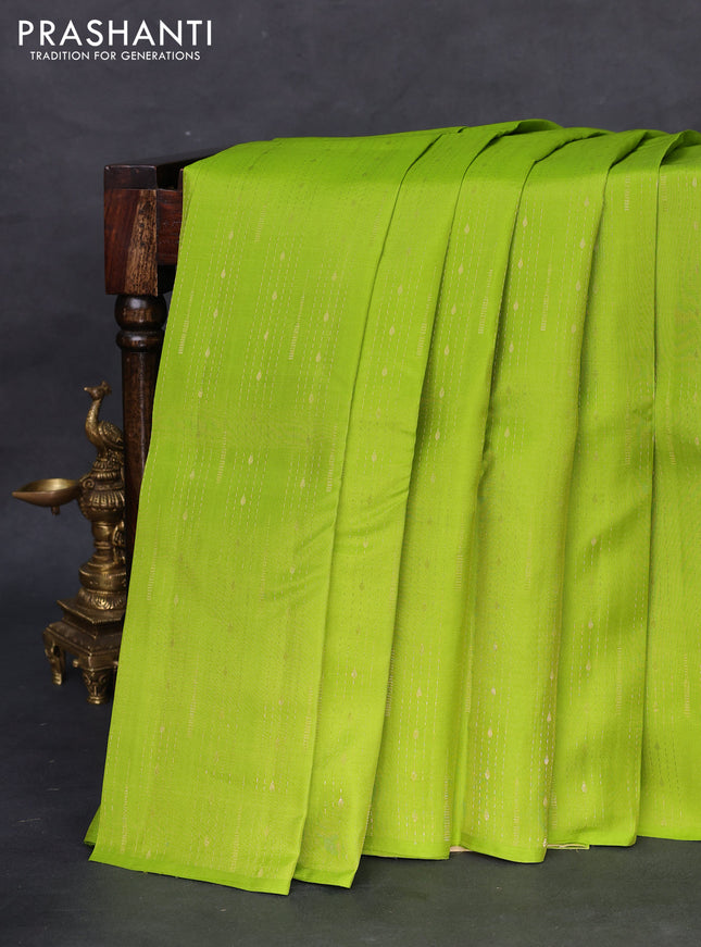 Kanchipuram silk saree light green and cream with allover zari weaves in borderless style