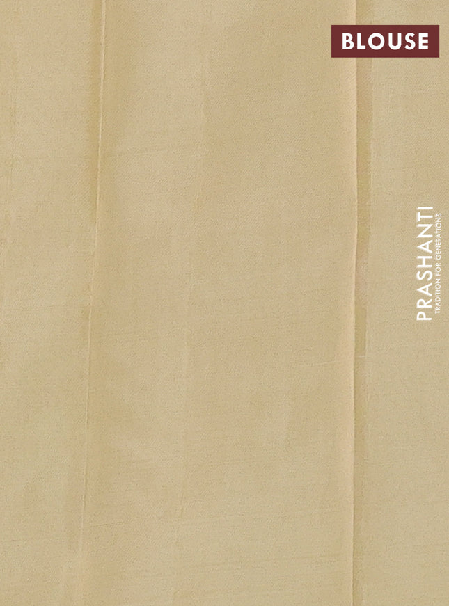 Kanchipuram silk saree light green and cream with allover zari weaves in borderless style