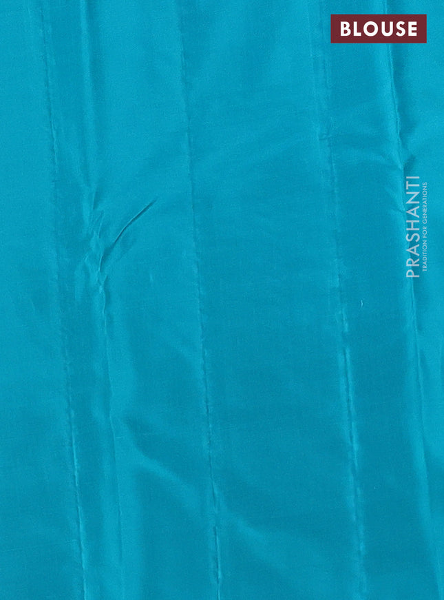 Kanchipuram silk saree red and teal blue with zari woven buttas in borderless style