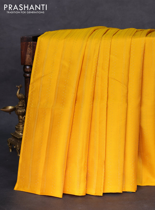 Kanchipuram silk saree yellow and teal shade with allover zari weaves in borderless style