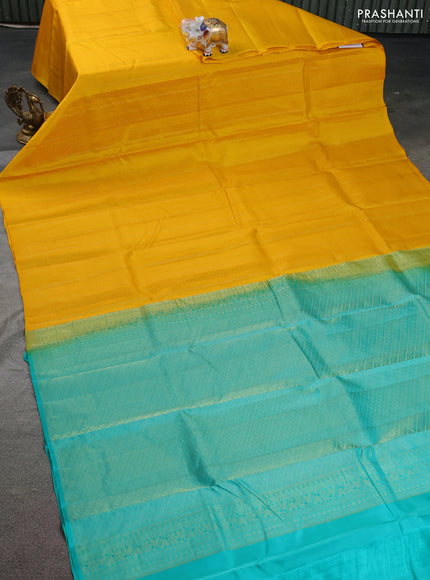 Kanchipuram silk saree yellow and teal shade with allover zari weaves in borderless style
