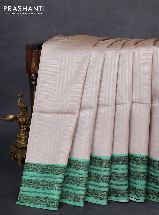 Semi tussar saree beige and green with allover thread weaves and thread woven border