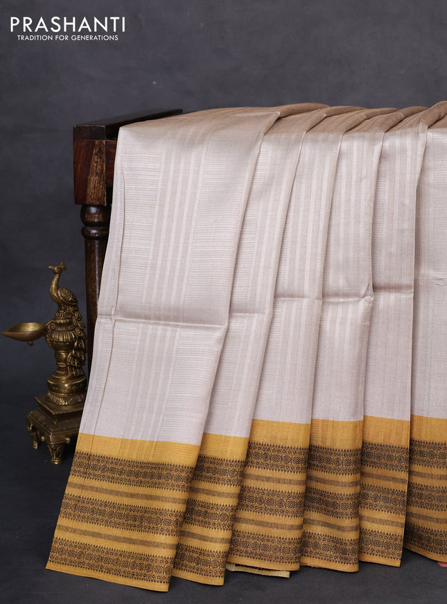 Semi tussar saree beige and mustard yellow with allover thread weaves and thread woven border