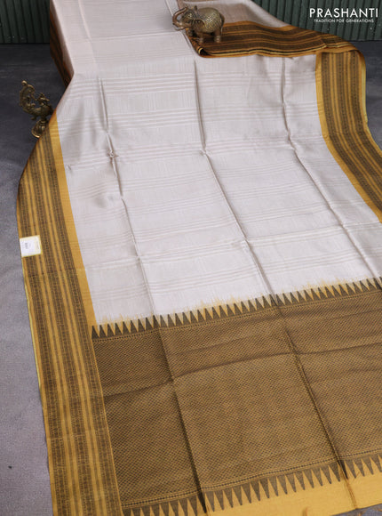 Semi tussar saree beige and mustard yellow with allover thread weaves and thread woven border