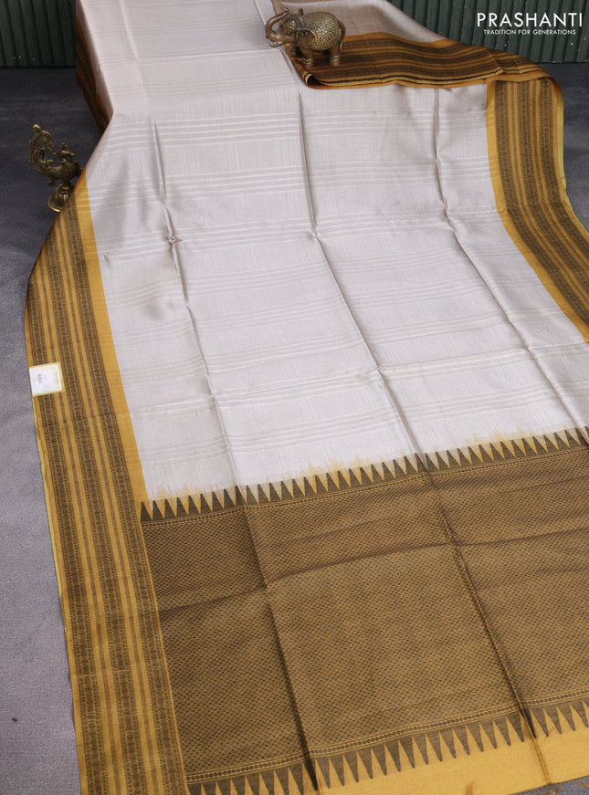Semi tussar saree beige and mustard yellow with allover thread weaves and thread woven border