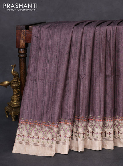 Semi tussar saree pastel wine shade and beige with plain body and embroidery pallu & border