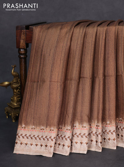 Semi tussar saree brown shade and beige with plain body and embroidery pallu & border