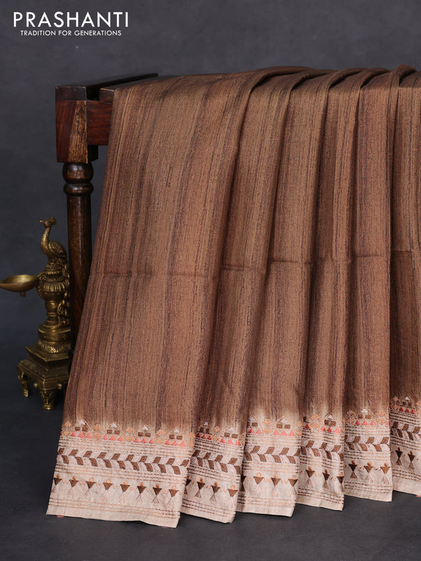 Semi tussar saree brown shade and beige with plain body and embroidery pallu & border