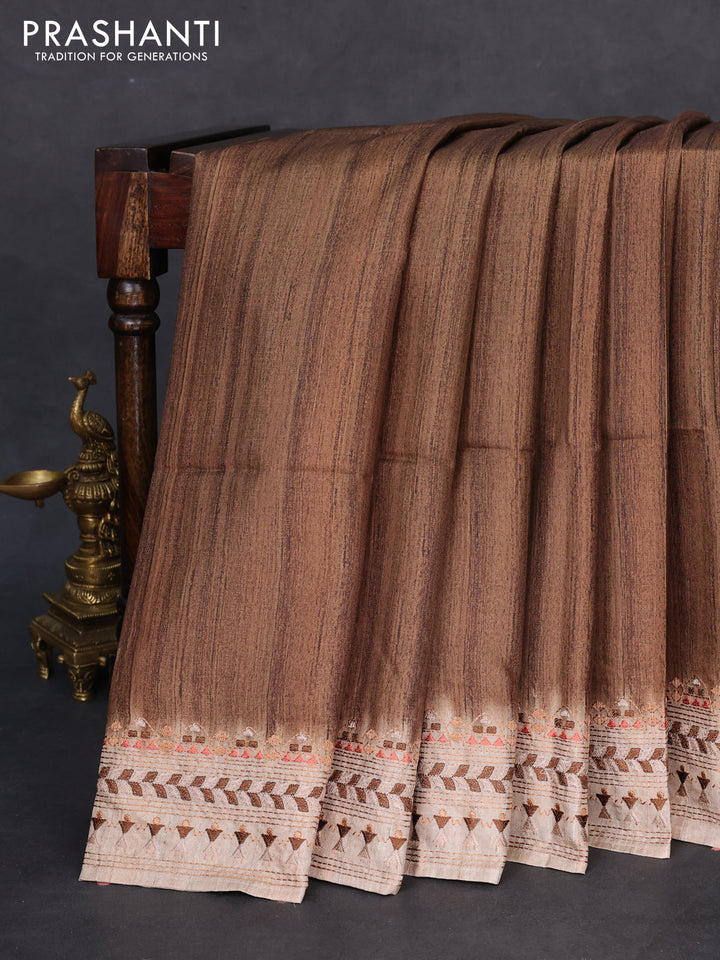 Semi tussar saree brown shade and beige with plain body and embroidery pallu & border