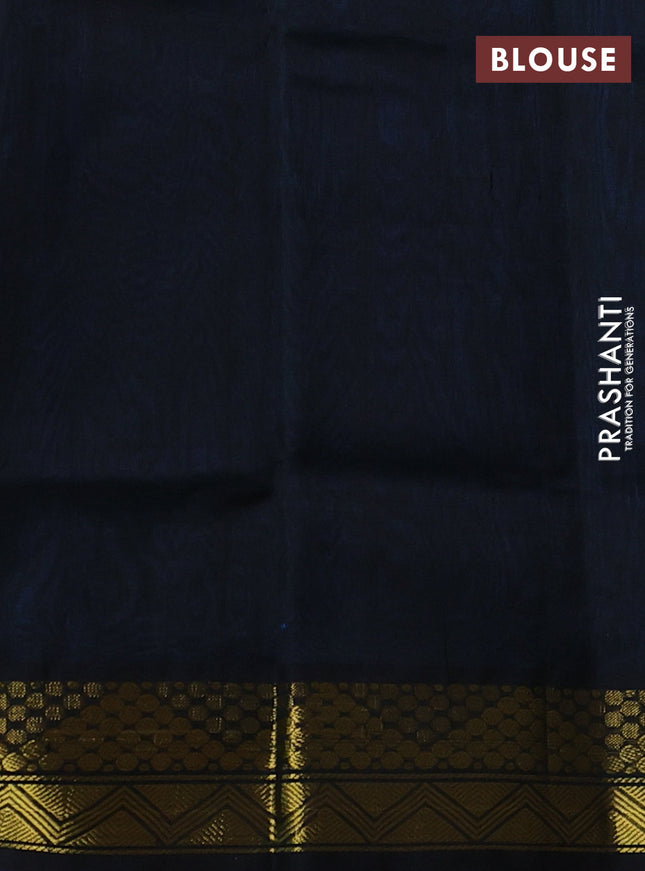 Silk cotton saree dual shade of bluish green and black with plain body and zari woven border