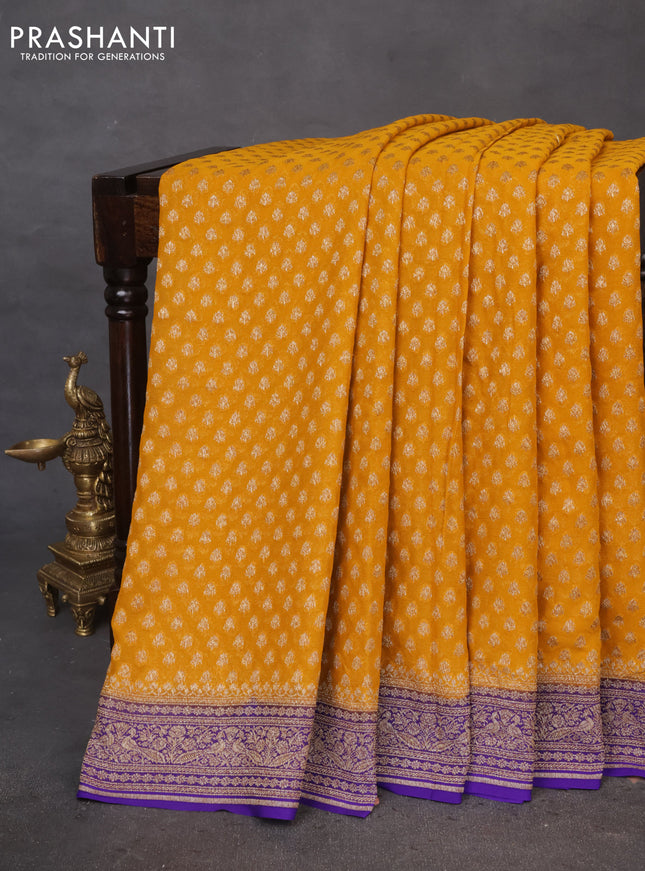 Banarasi georgette saree mustard yellow and blue with allover thread & zari butta weaves and woven border