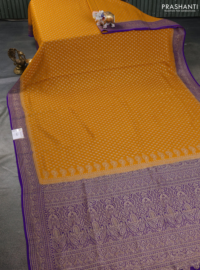 Banarasi georgette saree mustard yellow and blue with allover thread & zari butta weaves and woven border