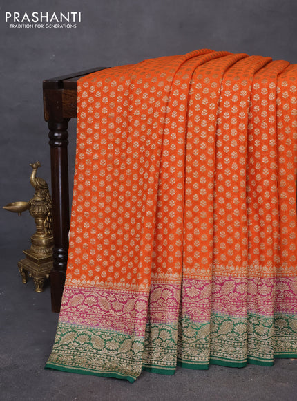 Banarasi georgette saree orange and pink green with allover thread & zari butta weaves and woven border