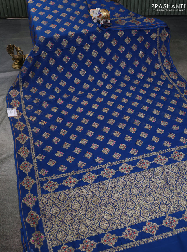 Banarasi georgette saree peacock blue with allover thread & zari butta weaves and woven butta border