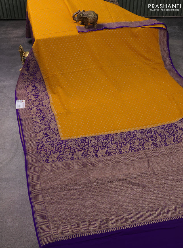 Banarasi georgette saree mustard yellow and violet with allover thread & zari butta weaves and long woven border