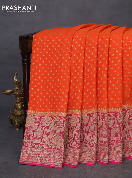 Banarasi georgette saree orange and dark pink with allover thread & zari butta weaves and long woven border