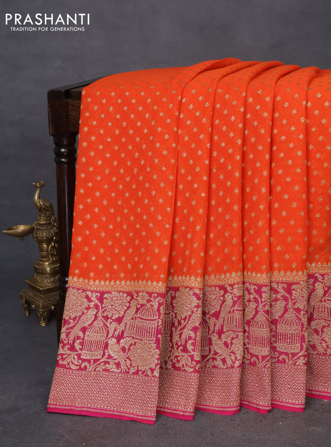 Banarasi georgette saree orange and dark pink with allover thread & zari butta weaves and long woven border