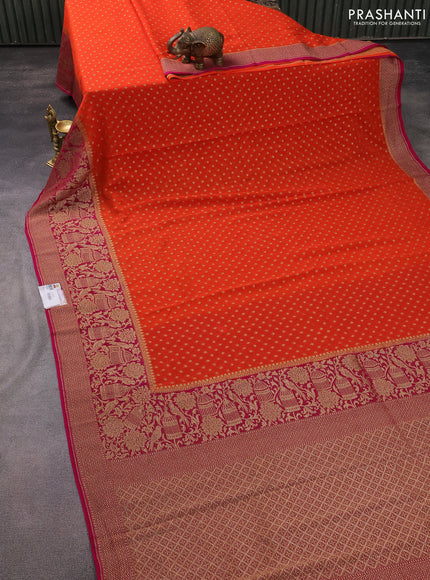 Banarasi georgette saree orange and dark pink with allover thread & zari butta weaves and long woven border